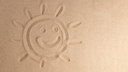  Symbol of sun drawing on sand, background for vacation. Summer background with copy space