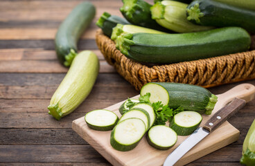 Fresh organic zucchini on the wooden table
