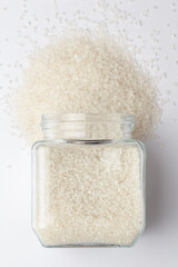 organic white  sago or sabudana small size spilled and in a glass jar, Top view