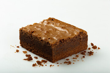Fototapeta na wymiar Delicious pieces of fresh brownie on white background. Chocolate pie.