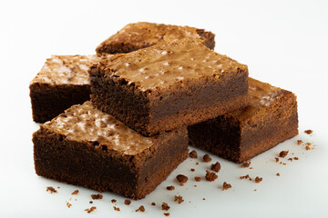 Delicious pieces of fresh brownie on white background. Chocolate pie.