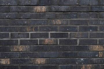 Dark brick wall with even surface, background for template, no person