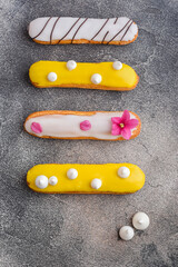 Handmade vanilla and mango eclair