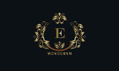 Exquisite bronze monogram on a dark background with the letter E. Stylish logo is identical for a restaurant, hotel, heraldry, jewelry, labels, invitations.