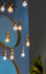 designer light bulbs and a mirror in the hall