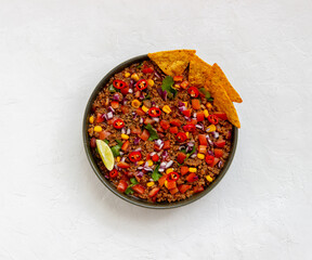 Chili con carne with nachos chips. Mexican food. National cuisine.