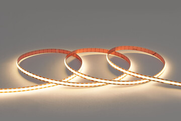 Glowing led strip in roll on white background