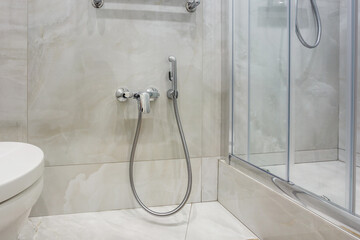  details of corner shower cabin with wall mount shower attachment and water tap sink with faucet in...