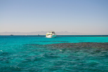 Red sea coral reef and blue sky. El Gouna, Egypt