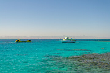 Fototapeta na wymiar Red sea coral reef and blue sky. El Gouna, Egypt