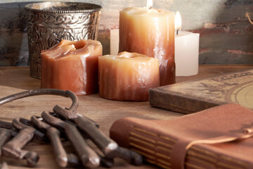 scented candles and other items on rustic wooden table