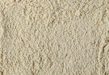Sesame protein powder background and texture, top view