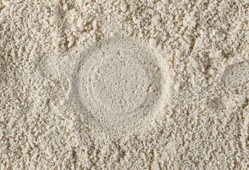 Fototapeta na wymiar Sesame protein powder background and texture, top view