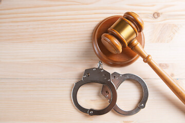 Legal law concept image - gavel and handcuffs