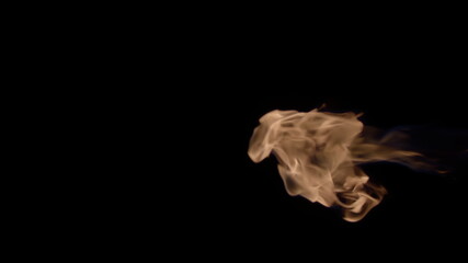Slow-motion video of fire and flames. A fire pit, burning gas or gasoline burns with fire and flames. A hellish glow of fire in the dark with copy space