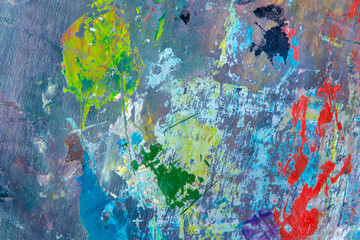 creative colored background: a temporary pattern of strokes and stains of fresh colored primer on...