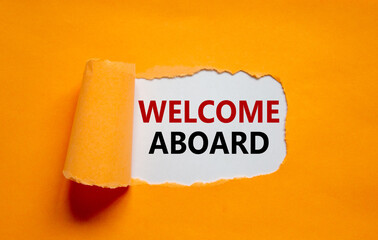 Welcome aboard symbol. Words 'Welcome aboard' appearing behind torn orange paper. Beautiful orange...