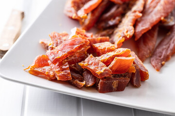 Dried chicken meat. Tasty jerky meat.