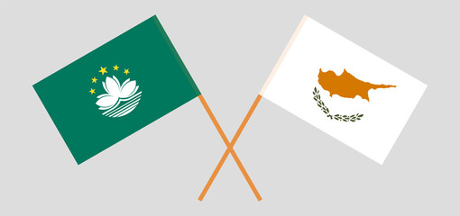 Crossed flags of Cyprus and Macau. Official colors. Correct proportion