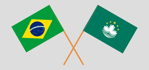 Crossed flags of Brazil and Macau. Official colors. Correct proportion