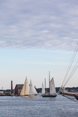 USA, Massachusetts, Cape Ann, Gloucester. Gloucester Schooner Festival, schooners in Gloucester Harbor at dusk