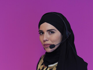 Portrait of young muslim woman with headphones
