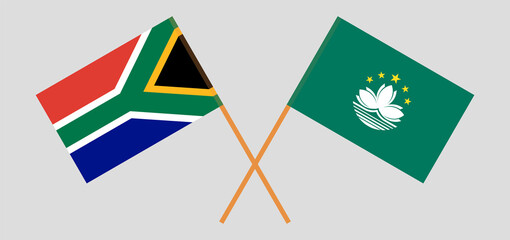 Crossed flags of Republic of South Africa and Macau. Official colors. Correct proportion