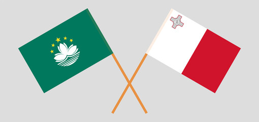 Crossed flags of Macau and Malta. Official colors. Correct proportion