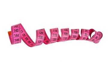 Pink tape measure roll isolated on the white background