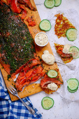 Gravlax on potato pancakes.style rustic