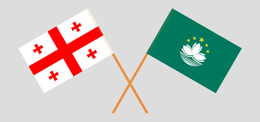Crossed flags of Georgia and Macau. Official colors. Correct proportion