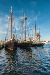 USA, Massachusetts, Cape Ann, Gloucester. Gloucester Schooner Festival, schooners at dusk