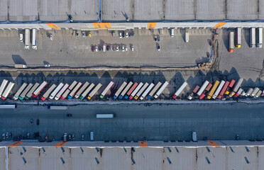 Aerial view of goods warehouse. Logistics center in industrial city zone from above. Aerial view of...