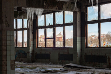 Fototapeta na wymiar an abandoned production facility with ice build-up inside