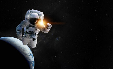 Astronaut spaceman outer space. Elements of this image furnished by NASA.