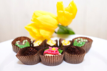 handmade candies and yellow tulips