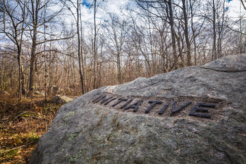 USA, Massachusetts, Cape Ann, Gloucester. Dogtown Rocks, inspirational saying carved on boulders in...