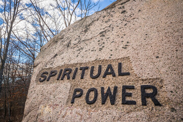 USA, Massachusetts, Cape Ann, Gloucester. Dogtown Rocks, inspirational saying carved on boulders in the 1920's, now in a pubic city park, 'Spiritual Power'.