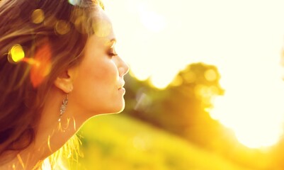 Young happy smile woman on a natural background