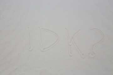 IDK? written in gypsum white sand at White Sands National Park in New Mexico.