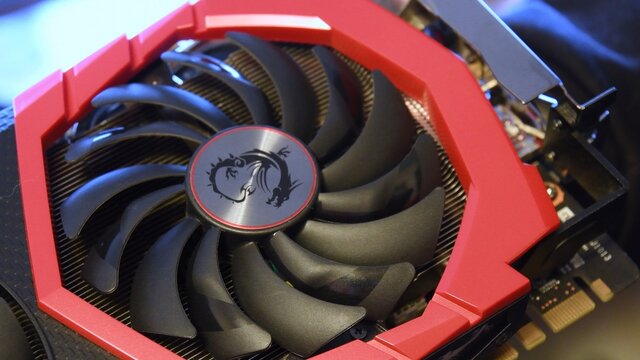 Powerful MSI GeForce GTX 1080 Gaming X 8G graphics card for e-sport gaming PC. Closeup video card cooling system fan with dragon logo in center. Computer hardware. Odessa, Ukraine 12 13 2020