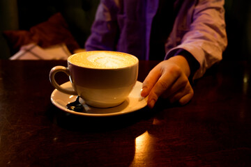 girl with a cup of matcha tea