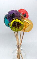 Colored lollipops in a bottle