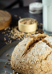 Homemade loaf of freshly baked green buckwheat bread and organic buckwheat milk. Ceramic, linen napkin. Harmless,wellness, gluten free healthy baking for vegans. Alternative bread and vegetarian milk