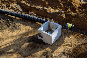 Assembling drainage system, rectangular drainage pipes holes on the concrete in the residential...