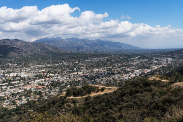 Cityscape view of homes and streets in La Crescenta, Montrose and Glendale in Los Angeles County California.  The San Gabriel Mountains are in background.  