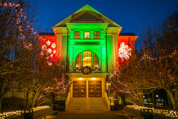 Fototapeta premium USA, Massachusetts, Cape Cod, Provincetown. Provincetown City Hall, Christmastime at dusk