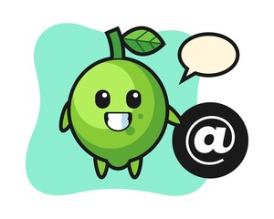 Cartoon illustration of lime standing beside the At symbol