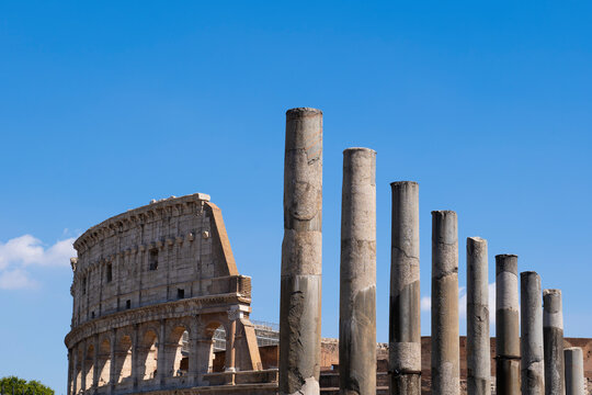 Italy, Rome, Colosseum, Via Sacra, Columns and ancient amphitheatre