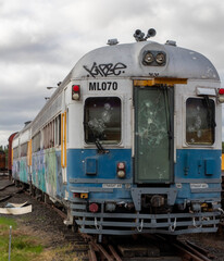 Trains with graffiti, the interior of trains, broken windows, spooky and old
